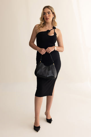 Amara Dress in soft viscose with delicate floral neckline details and strappy design, front view.