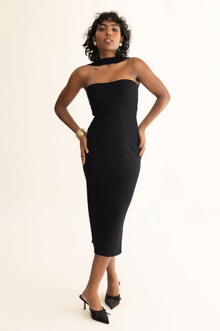 Aria black tube dress in soft viscose with a high neck and shawl-like sleeve.