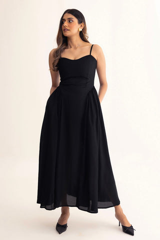 Zaria low-waist pleated maxi dress in soft viscose with spaghetti straps and a sweetheart neckline, front view.