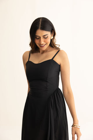 Close-up of Zaria Dress featuring a sweetheart neckline and soft low-waist pleats.