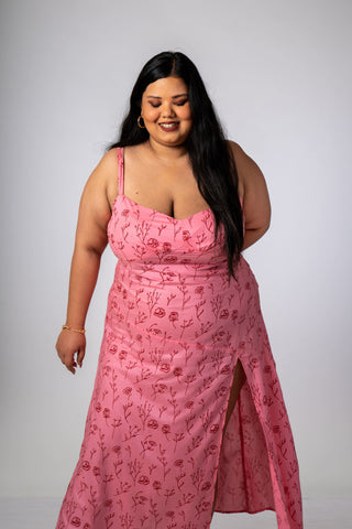 Side profile of the Grace Midi Dress, featuring soft draping and a flattering silhouette.