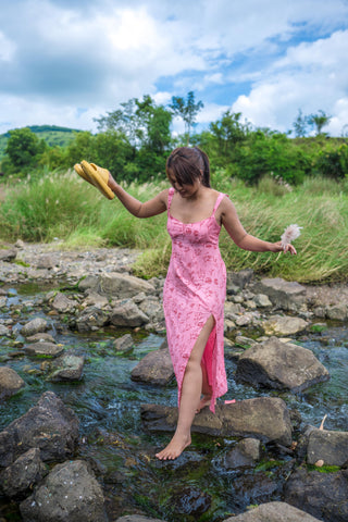 Model wearing the Grace Midi Dress, styled effortlessly for a romantic and chic summer look.