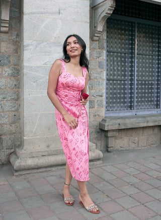Detailed view of Juliet Midi dress showcasing sweetheart neckline and front knot waist detail.