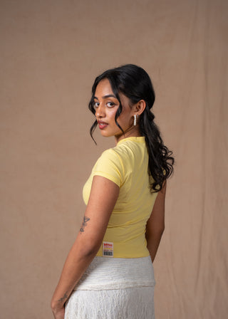 Back view of butter yellow Mango fitted baby tee