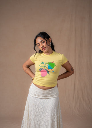 Butter yellow Mango tee styled for a casual summer look
