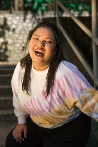 Close-up of tie-dye summer sweatshirt, highlighting lightweight fabric and relaxed fit.